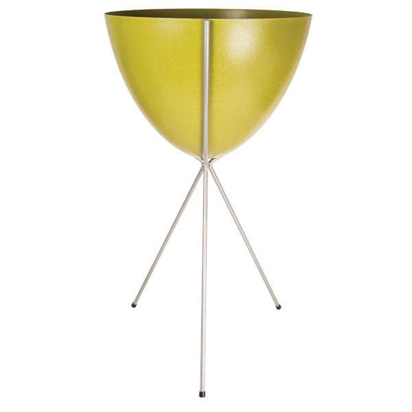 In front of a white background is an olive green colored bullet planter. The planter has a wide top and narrows at the bottom. The planter is held up by a silver metal stand. The stand has three silver metal legs.