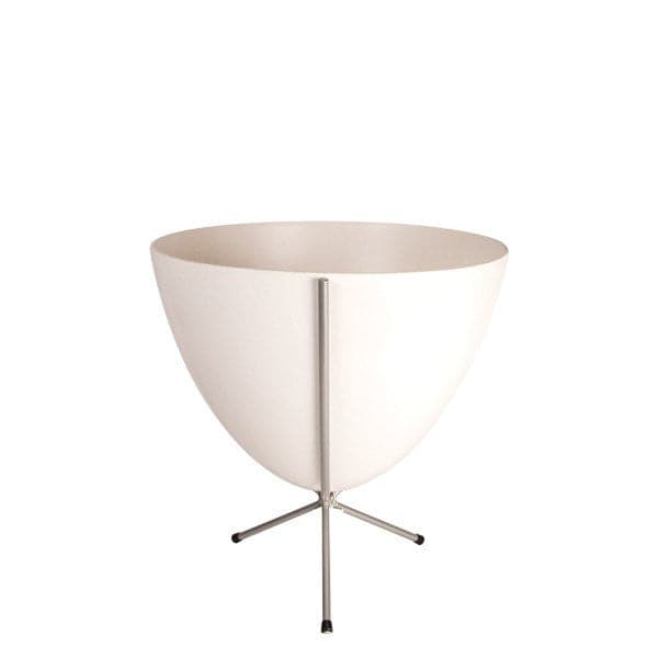 In front of white background is a white planter in a short silver metal stand. The bullet planter is wide at the top and narrow at the bottom. The metal stand has three legs. 