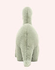 On a white background is a green brontosaurus stuffed animal.