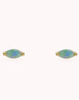 Opal oval stud earrings with gold detailing.