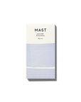 The smaller size of the chocolate bar with white and light purple packaging along with black letters at the top that read, "Mast Lavender Chocolate".