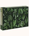 On a white background is a black puzzle box with an assortment of green house plant leaf illustrations on the front cover..