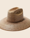 A darker brown straw sun hat with a wide curved brim and a drawstring.