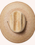A darker brown straw sun hat with a wide curved brim and a drawstring.