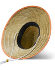 A wide brim sun set made of a neutral woven straw material with a white drawstring and tangerine orange detailing around the edge of the brim as well as the label in the center or the hat.