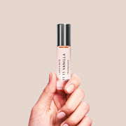 A glass rollerball of perfume oil with black text that reads, 'Lake & Skye 1111 Vanilla Fragrance'. 