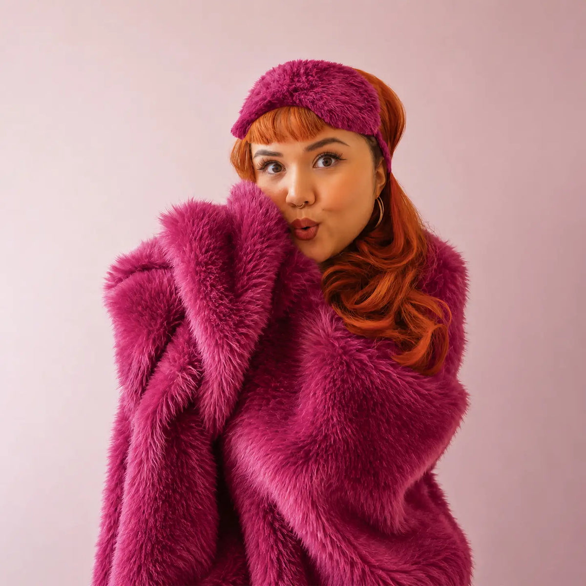 hot pink fur blanket with a tag that reads "bestie".