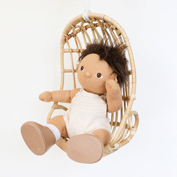 On a white background is a rattan egg shaped chair with a doll inside (not included with purchase).
