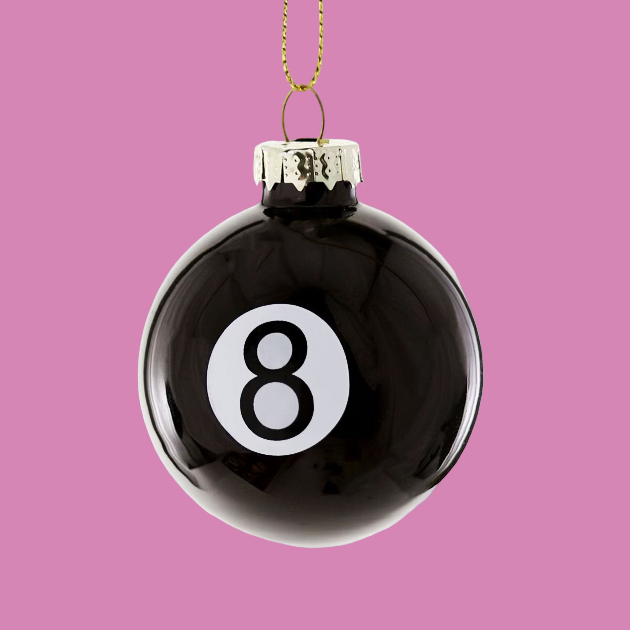 A glass eight ball shaped ornament. 