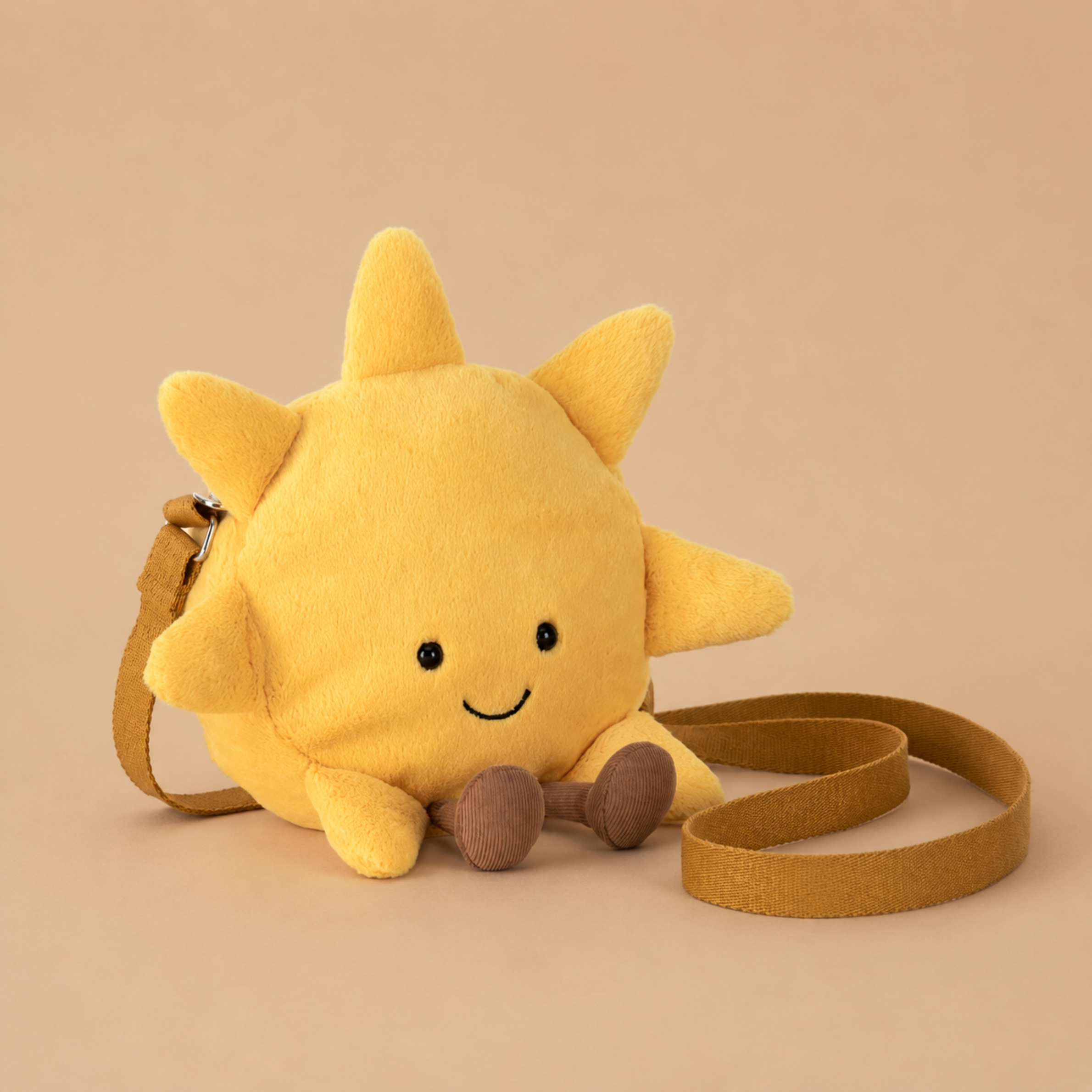 a smiling sunshine shaped shoulder bag.