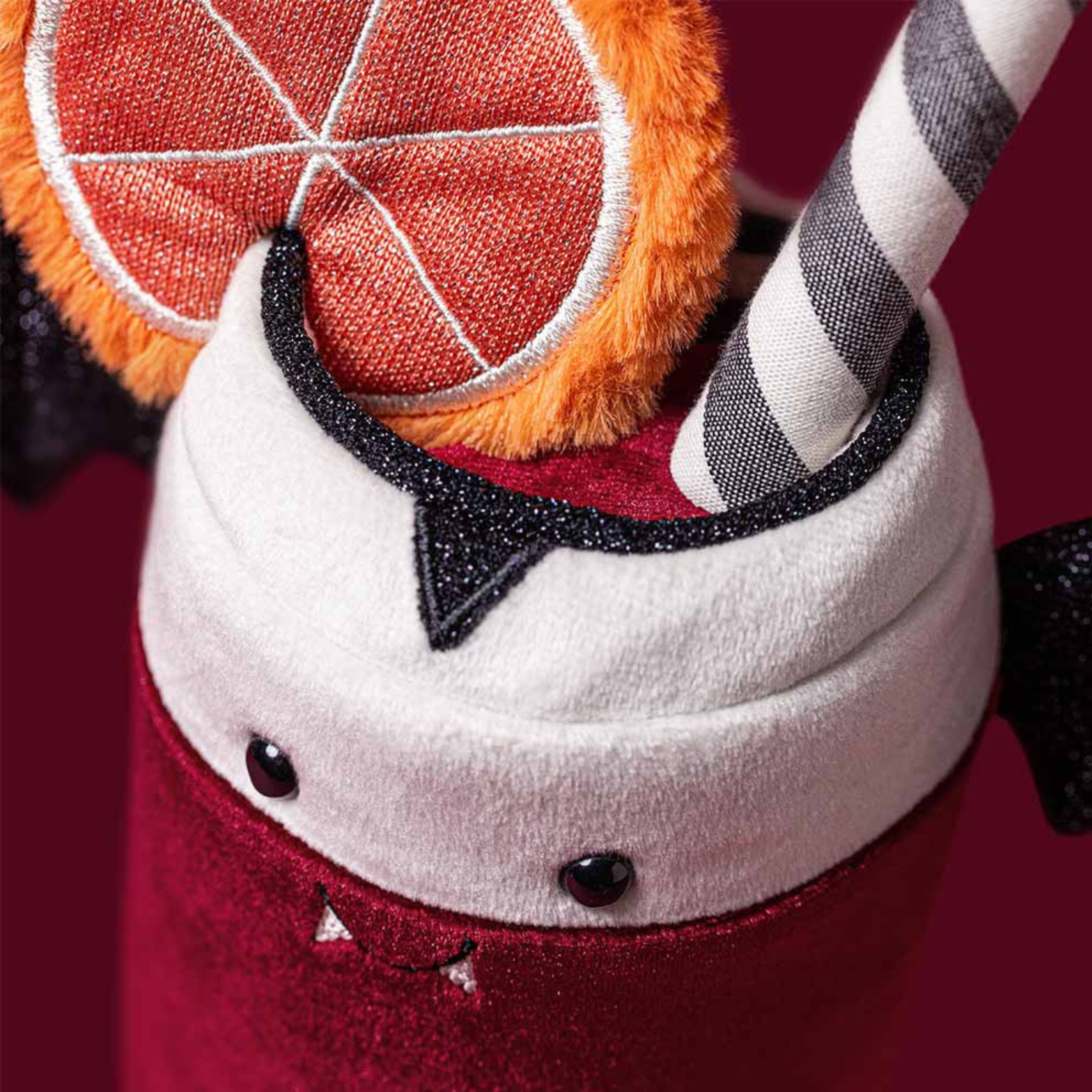 a soda can shaped vampire plush toy. 