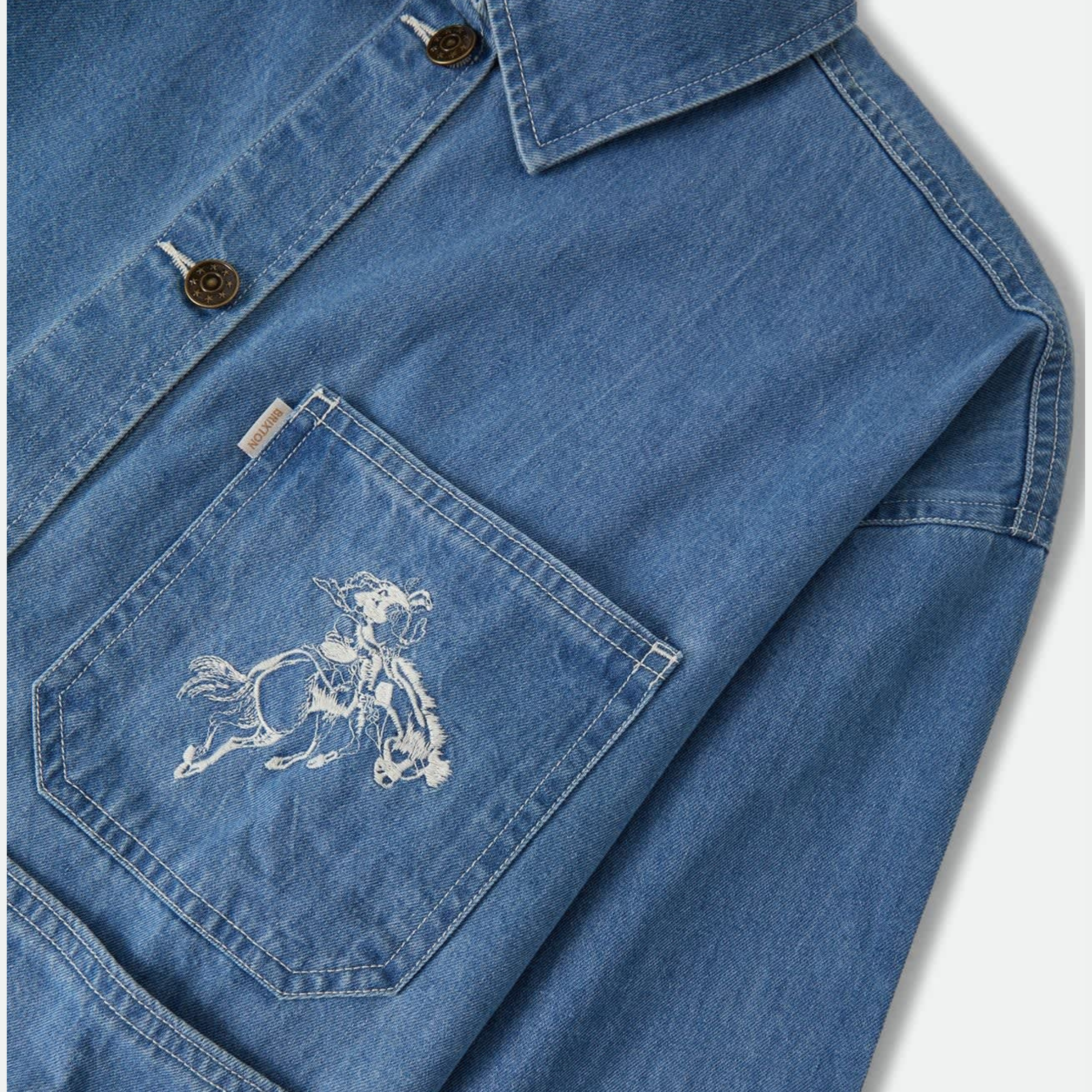 a light blue denim barn jacket with a horse and star embroidered design. 