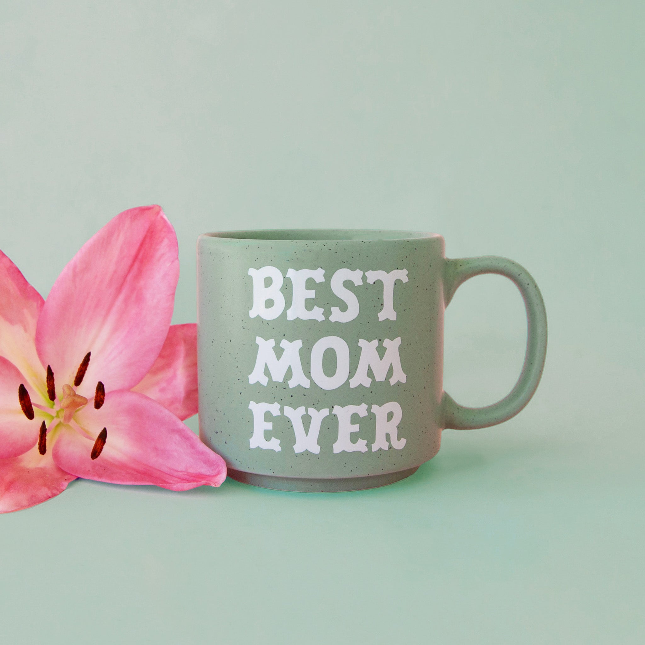 A mint green speckle mug with white text that reads, "Best Mom Ever". 