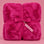 hot pink fur blanket with a tag that reads "bestie".