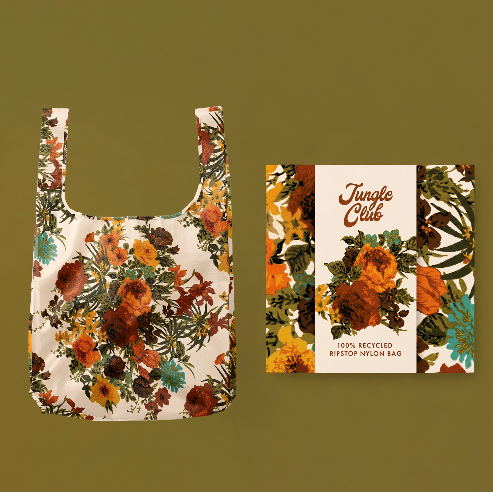 Floral-patterned reusable bag with packaging on a green background.