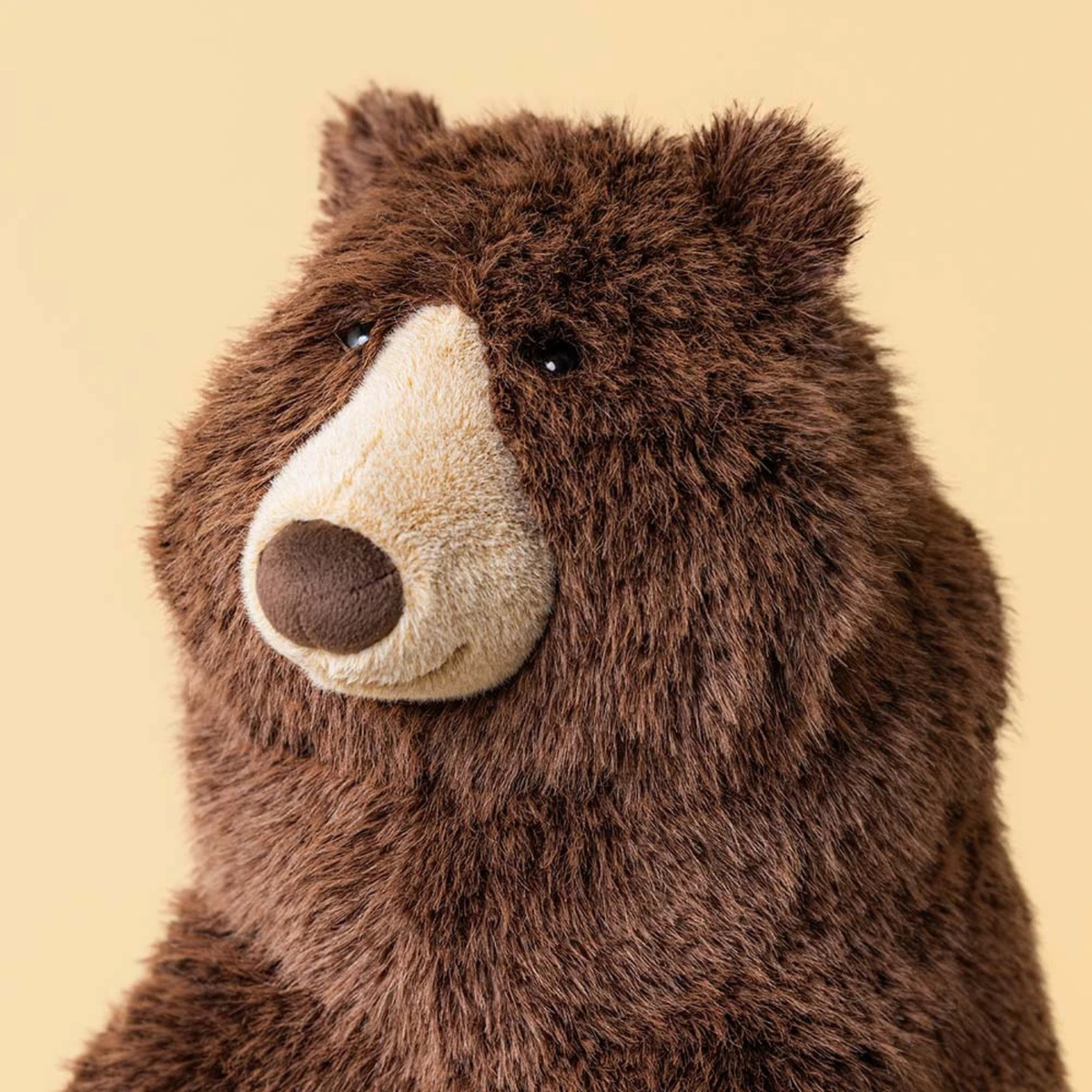 a bear shaped plush toy. 