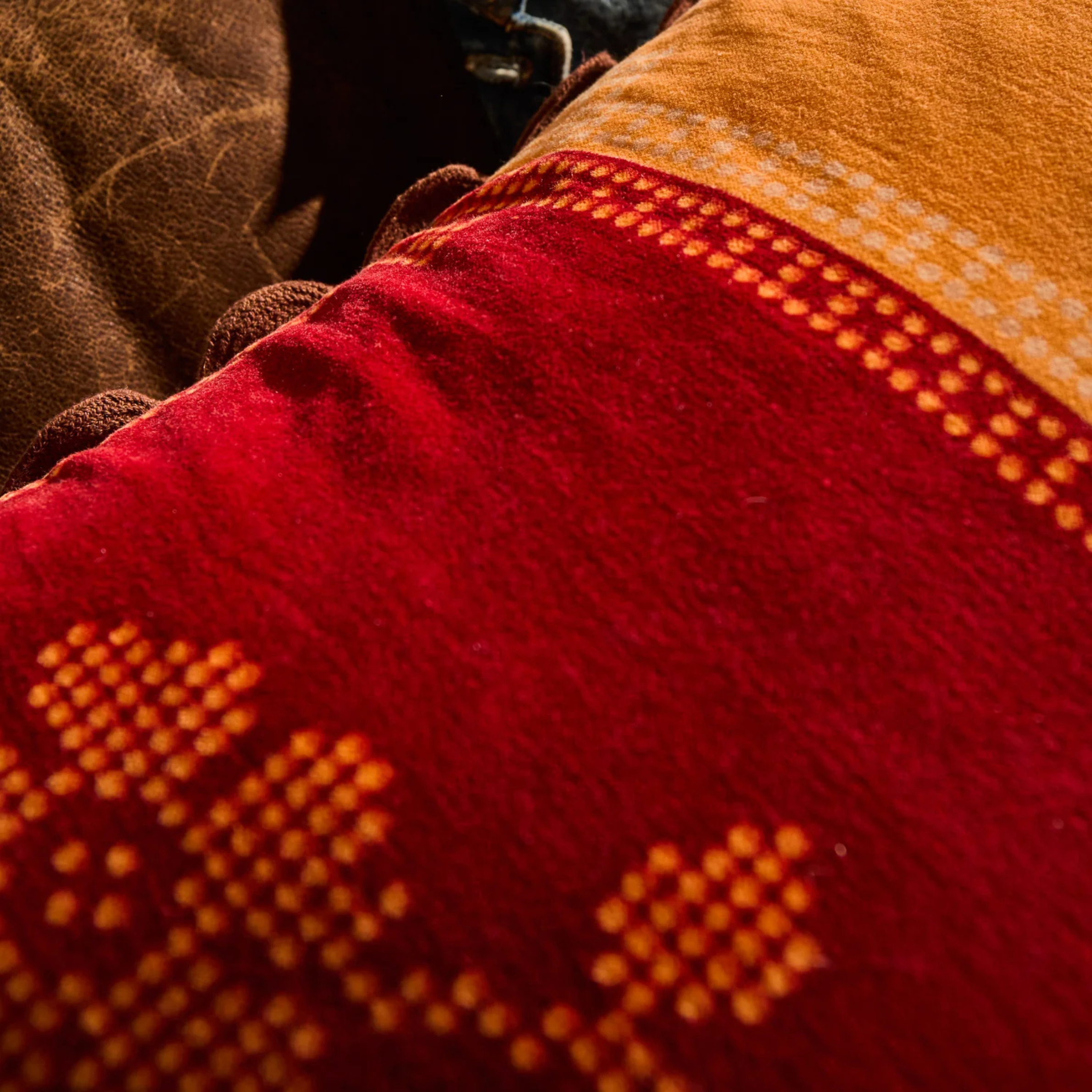 a floral print color block square pillow. 