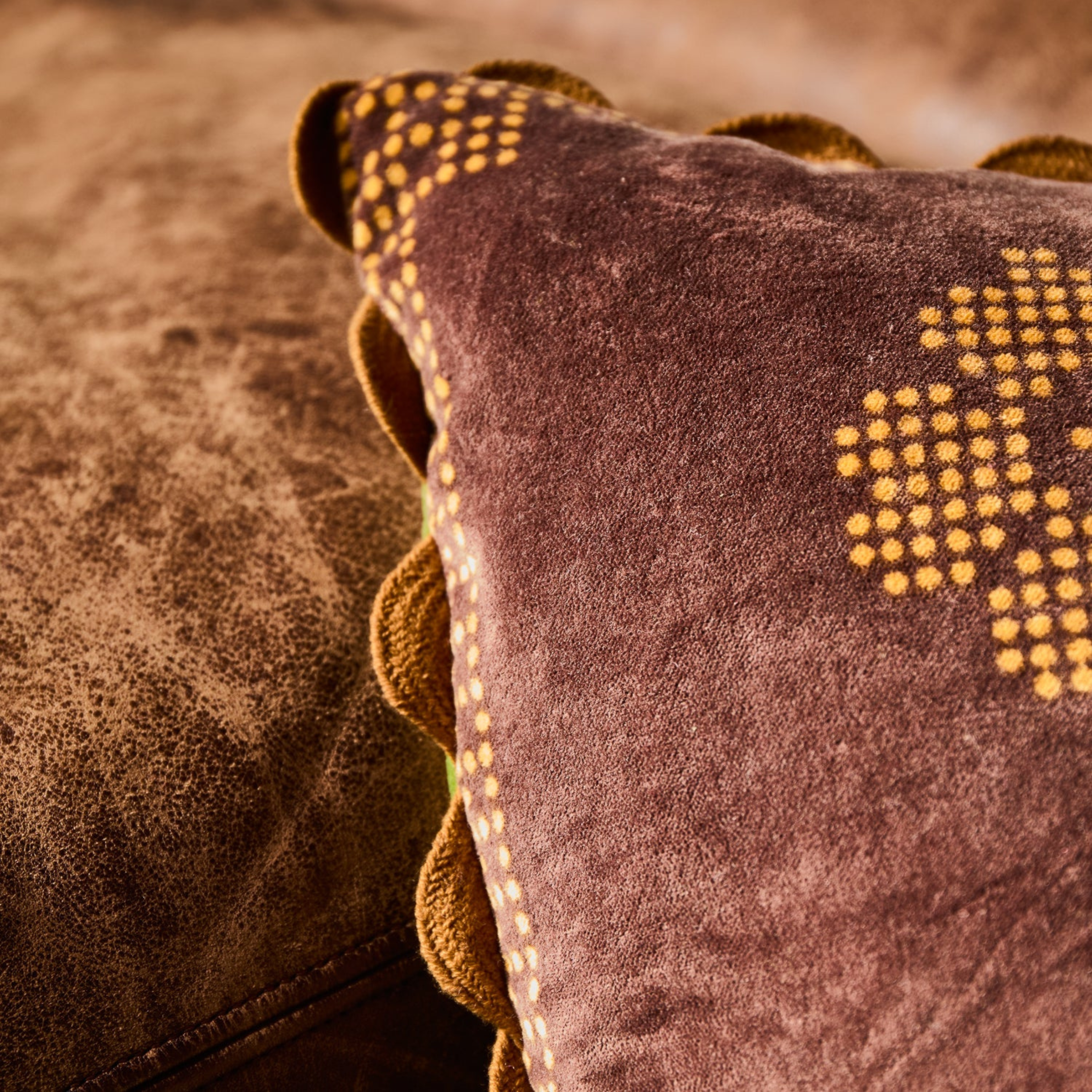 a reversible pillow with a floral print and color block design. 