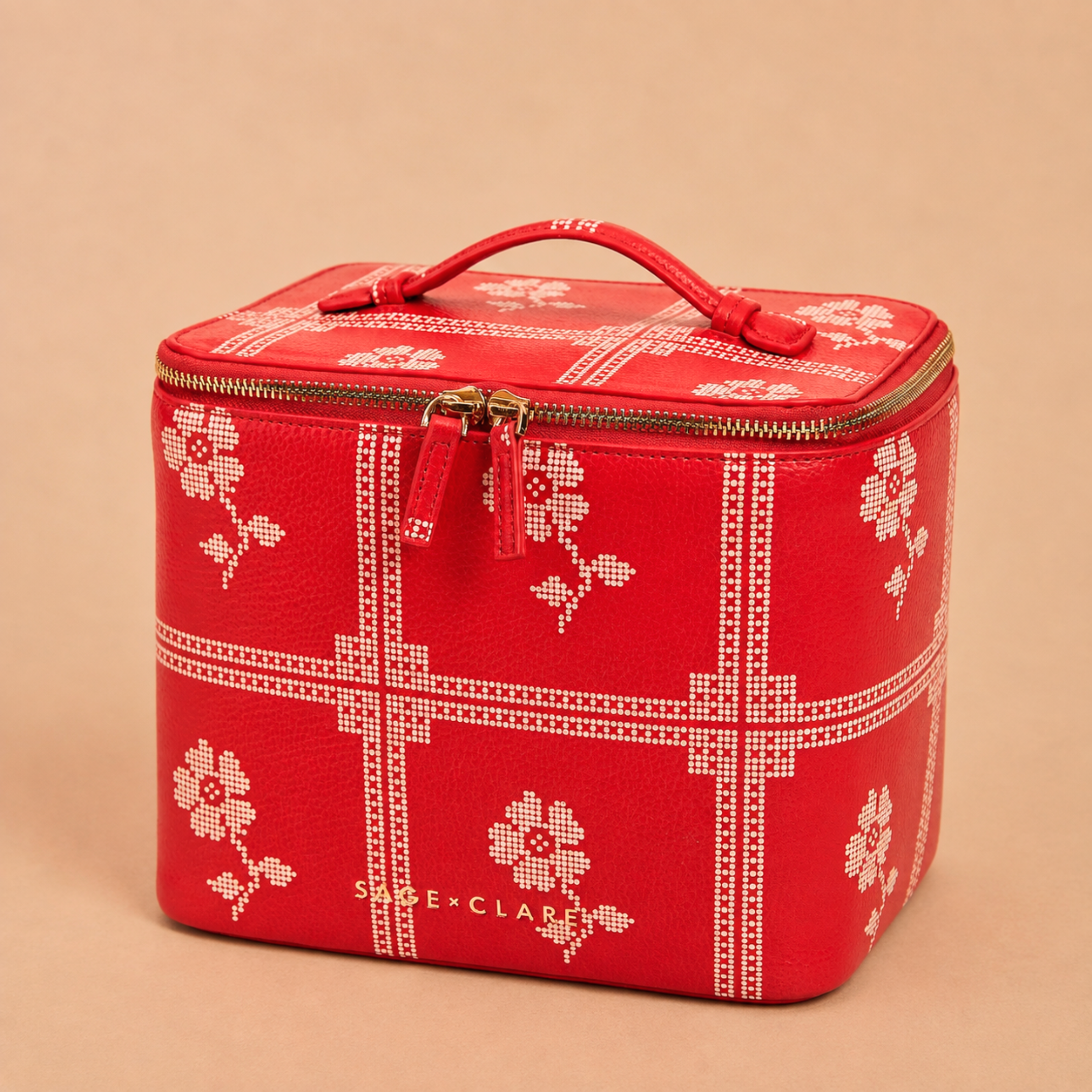 a red and cream vanity case. 