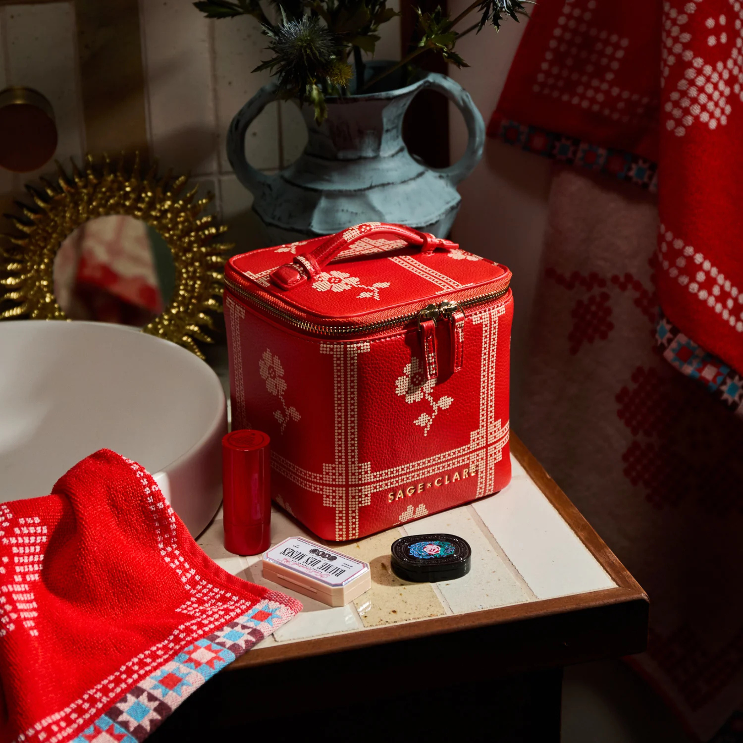 a red and cream vanity case. 