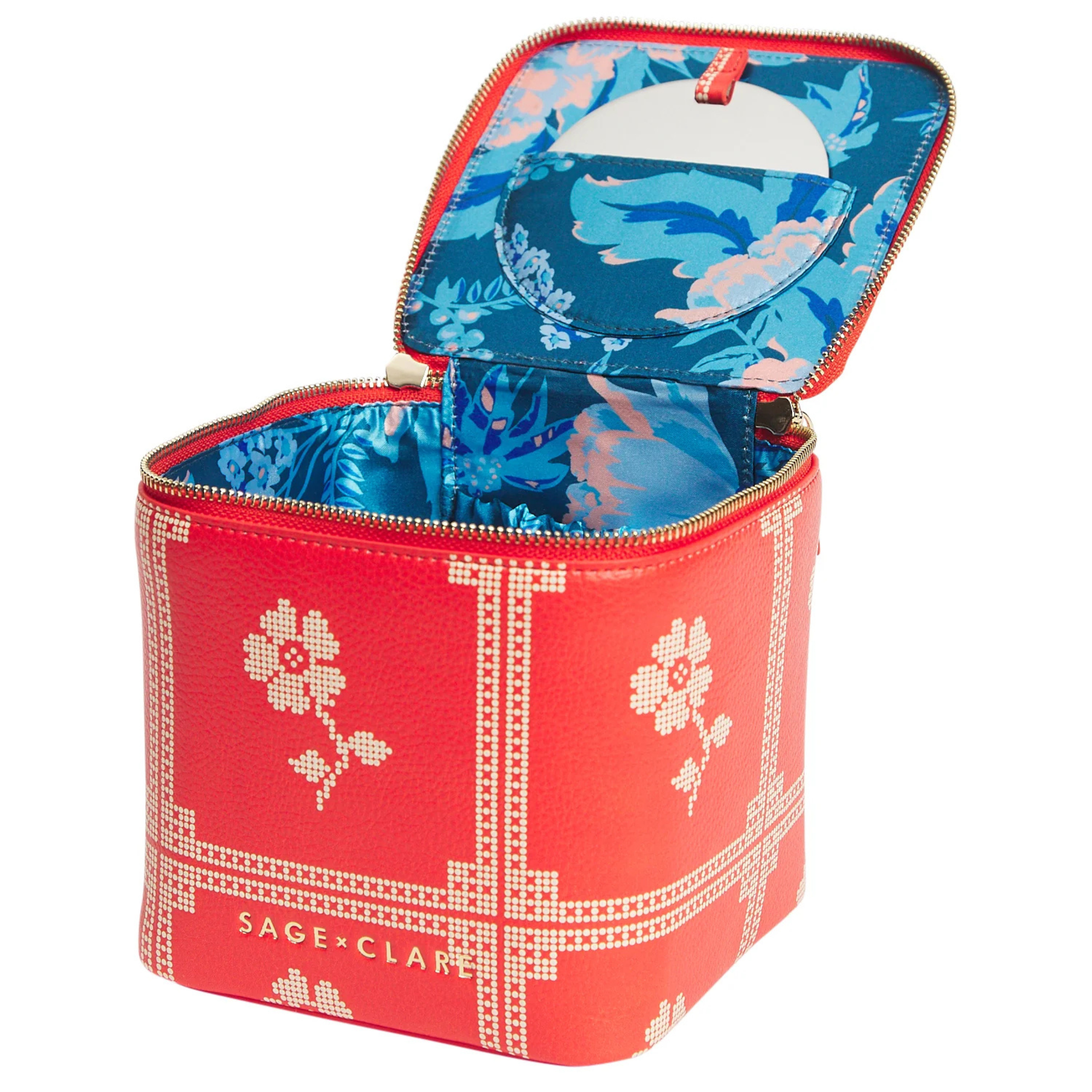 a red and cream vanity case. 