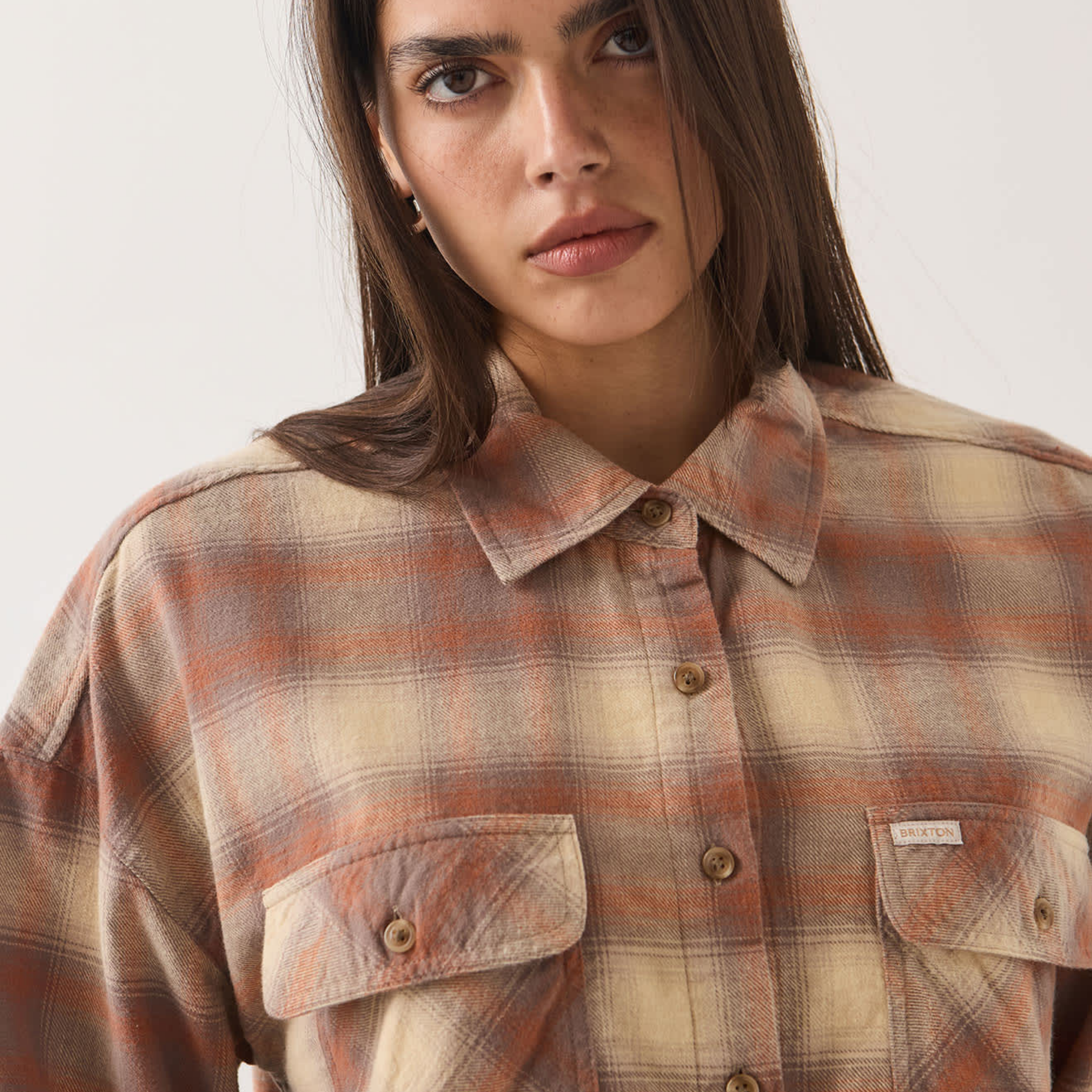 a cropped plaid button up shirt. 