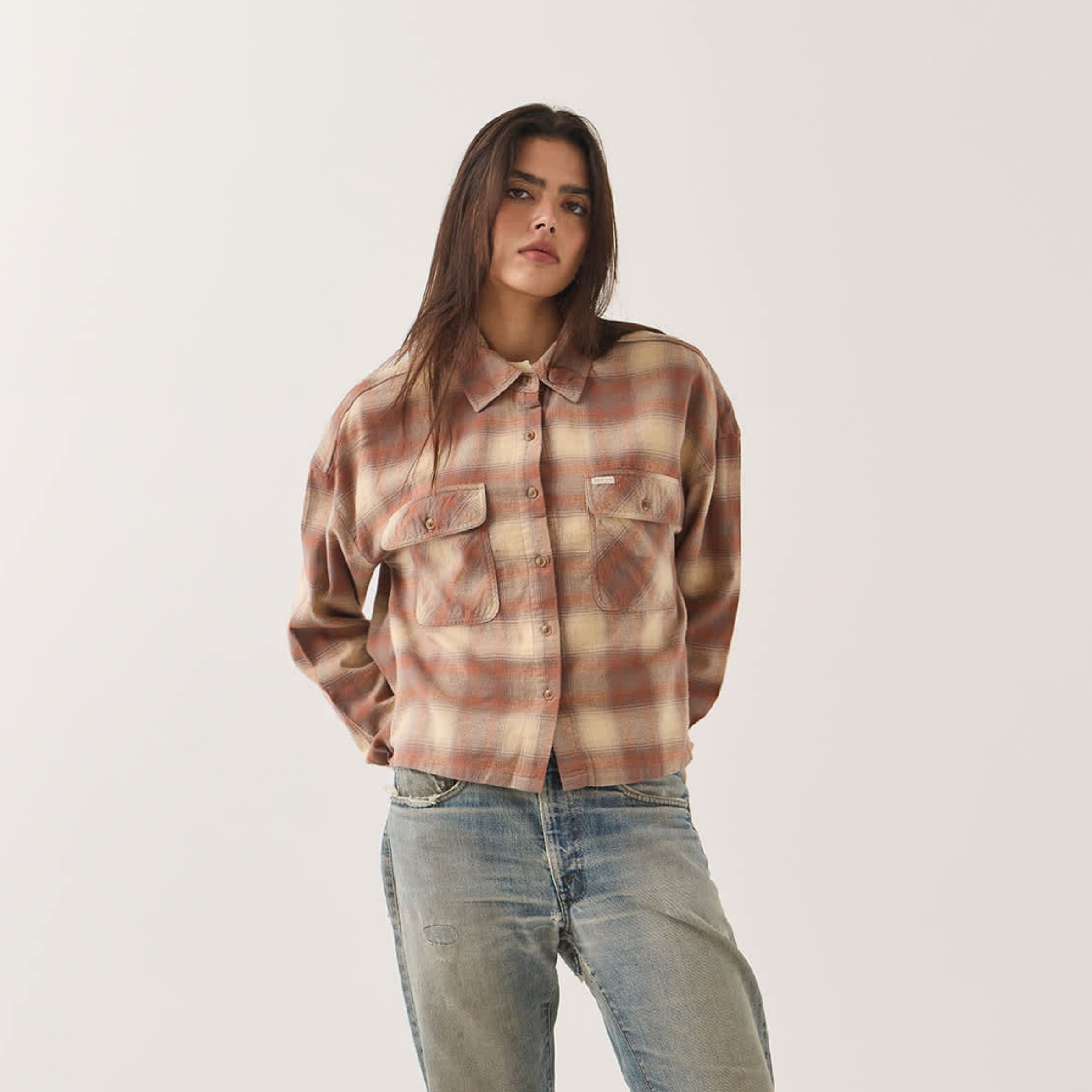 a cropped plaid button up shirt. 
