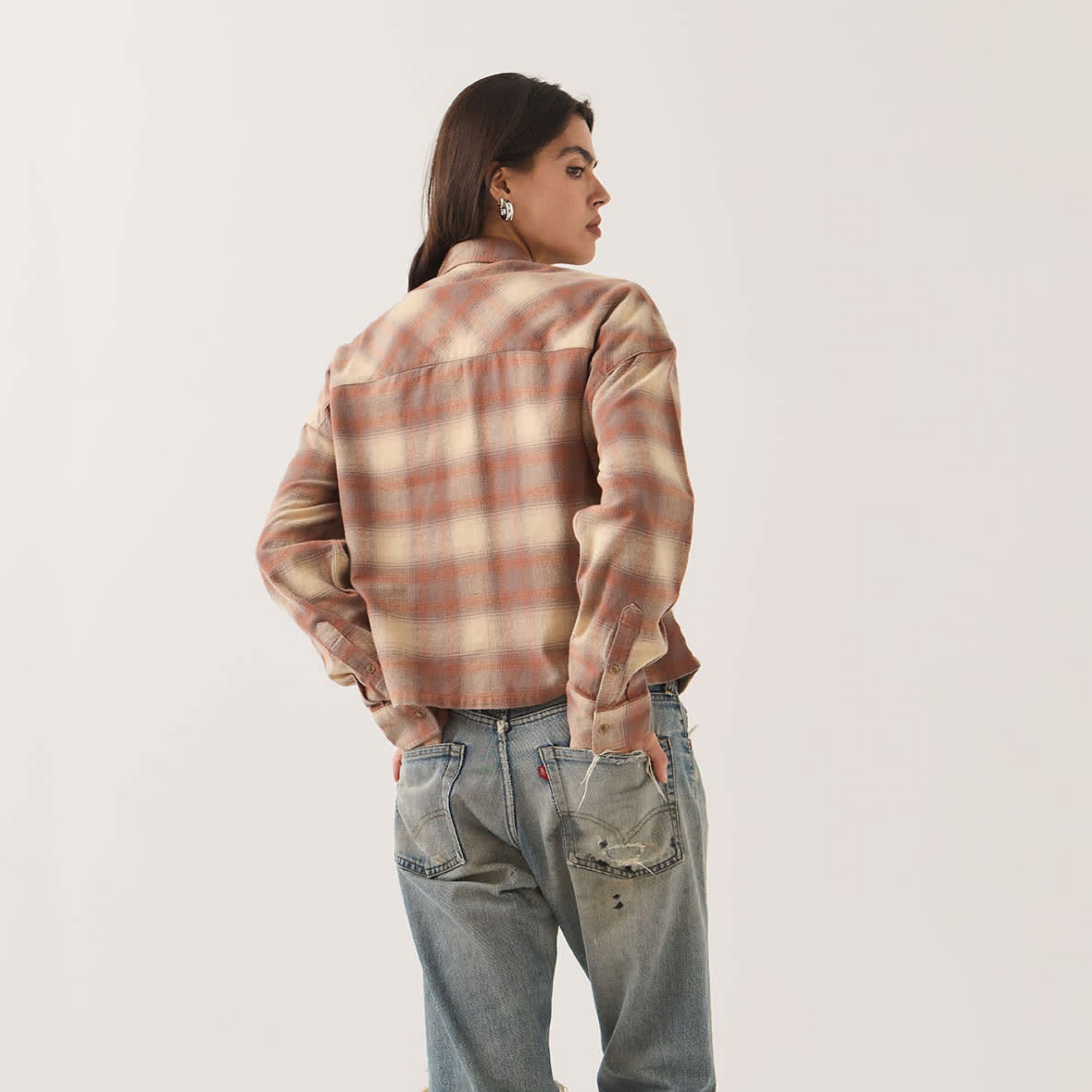 a cropped plaid button up shirt. 