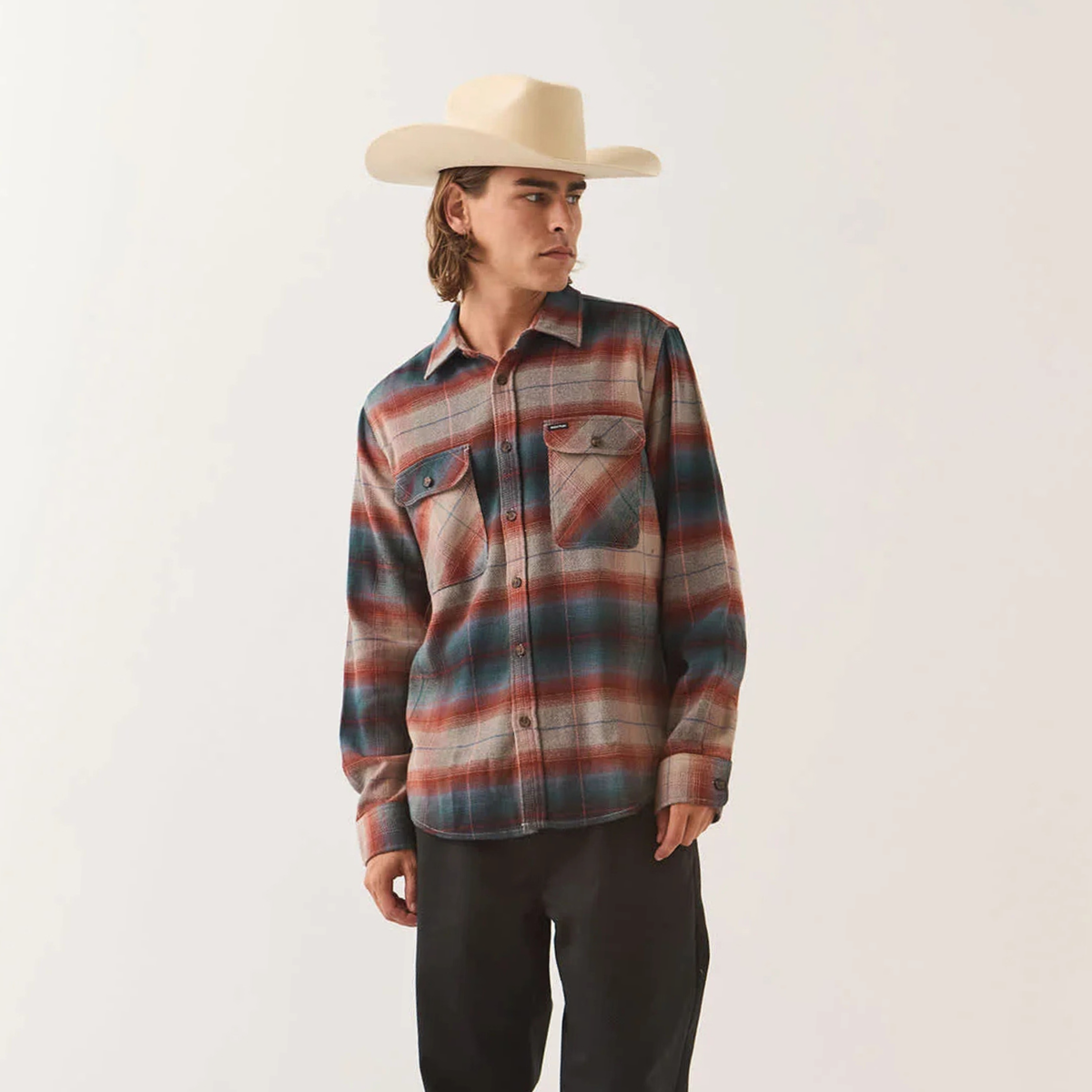 a blue, red and tan flannel. 
