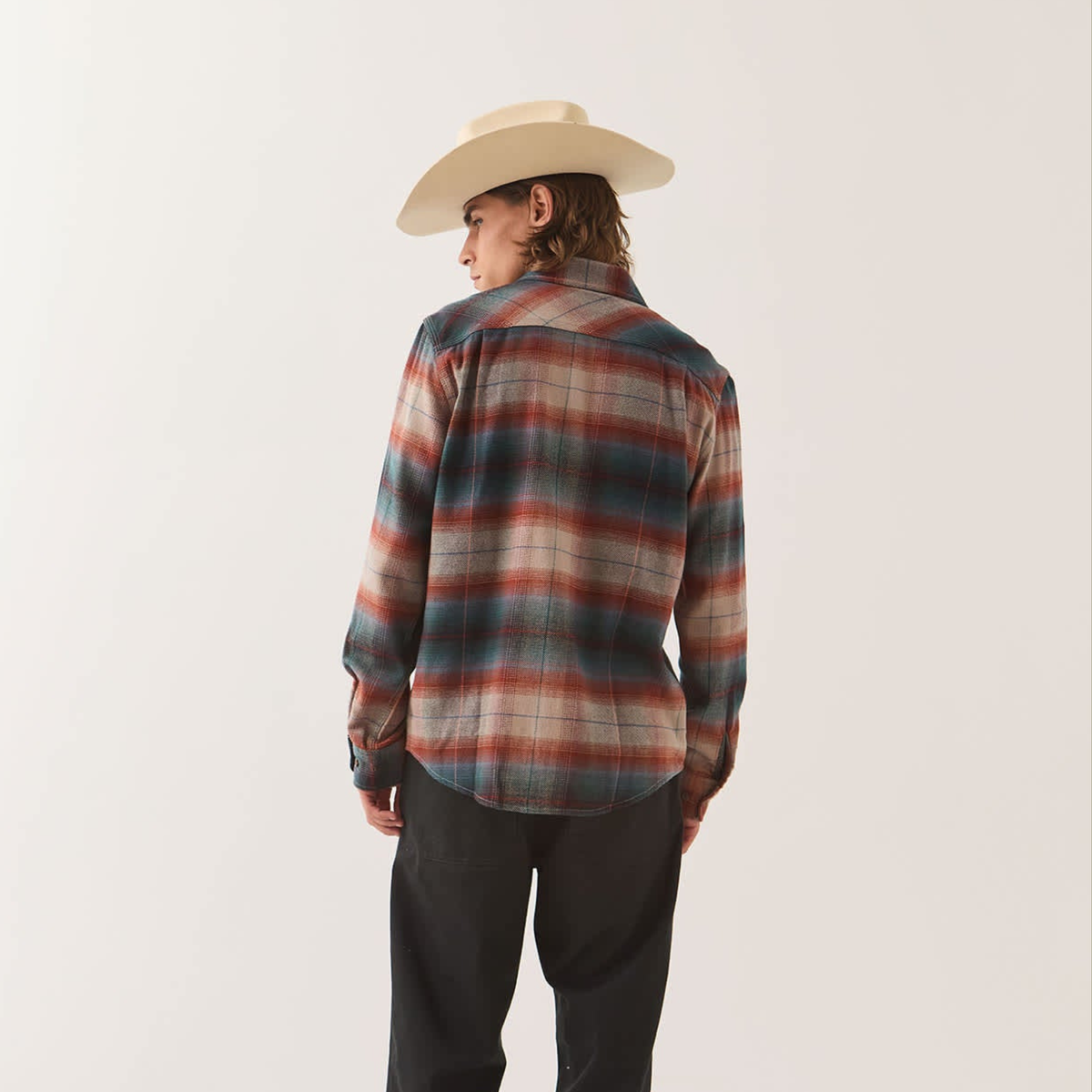a blue, red and tan flannel. 