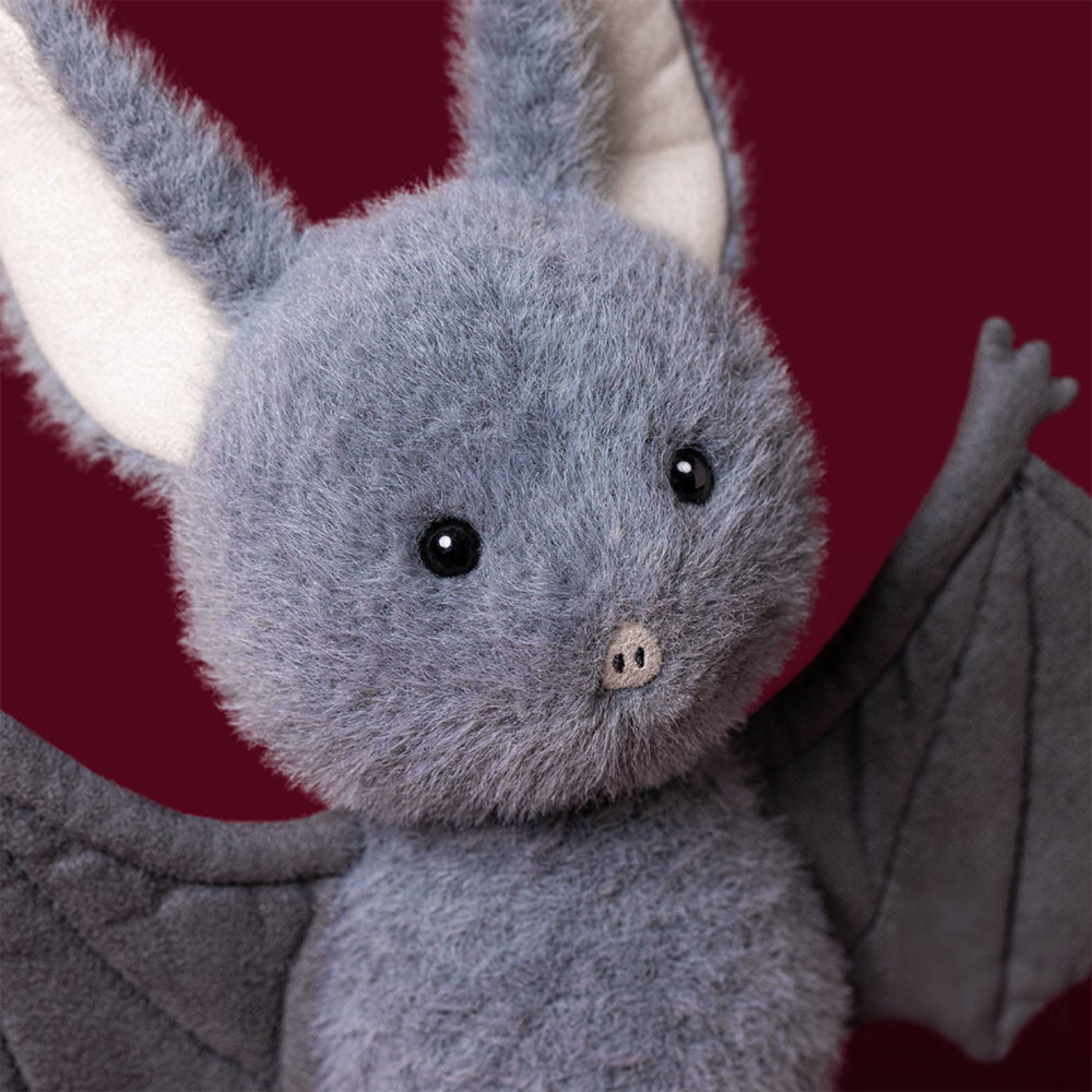 a bat shaped plush toy. 