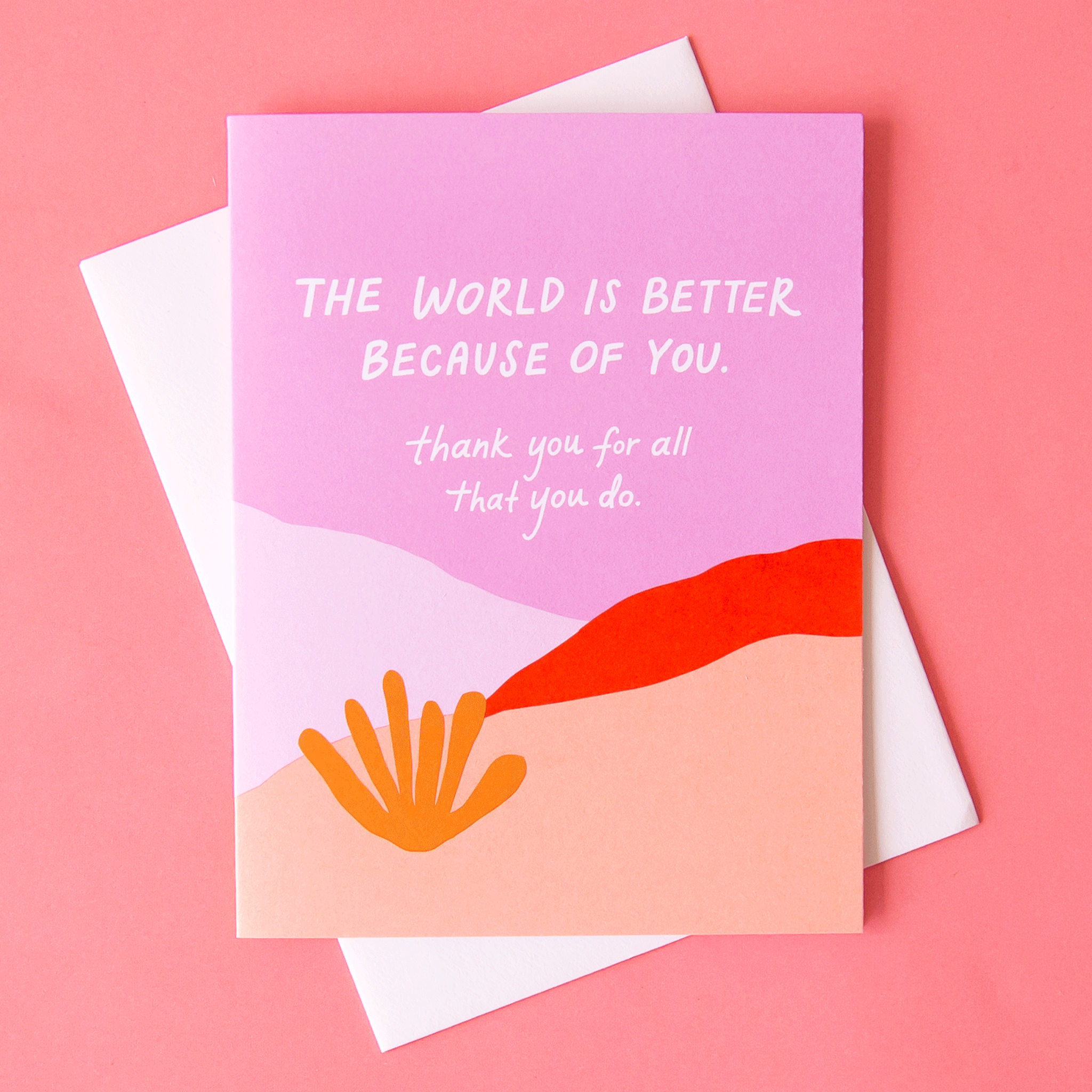 On a pink background is a purple, red and pink card featuring an abstract desert scape with white text in the center that reads, "The World Is Better Because Of You thank you for all that you do."