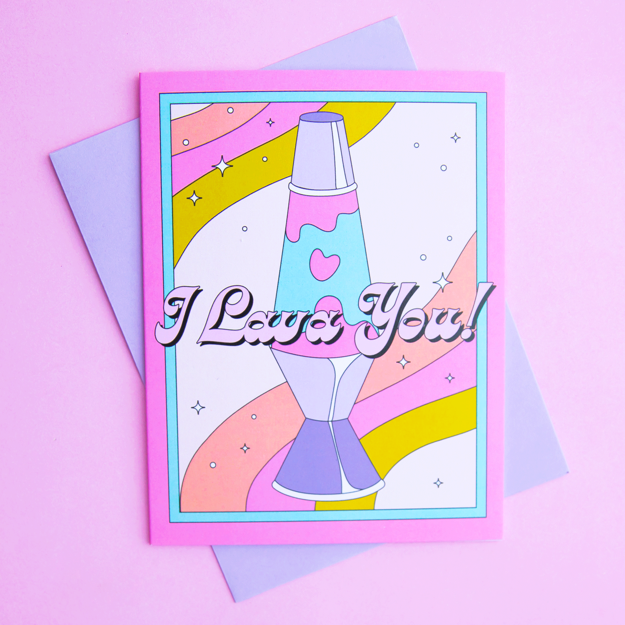 On a purple background is a multi colored card with a lava lamp and text across the center that reads, &quot;I Lava You!&quot;. 