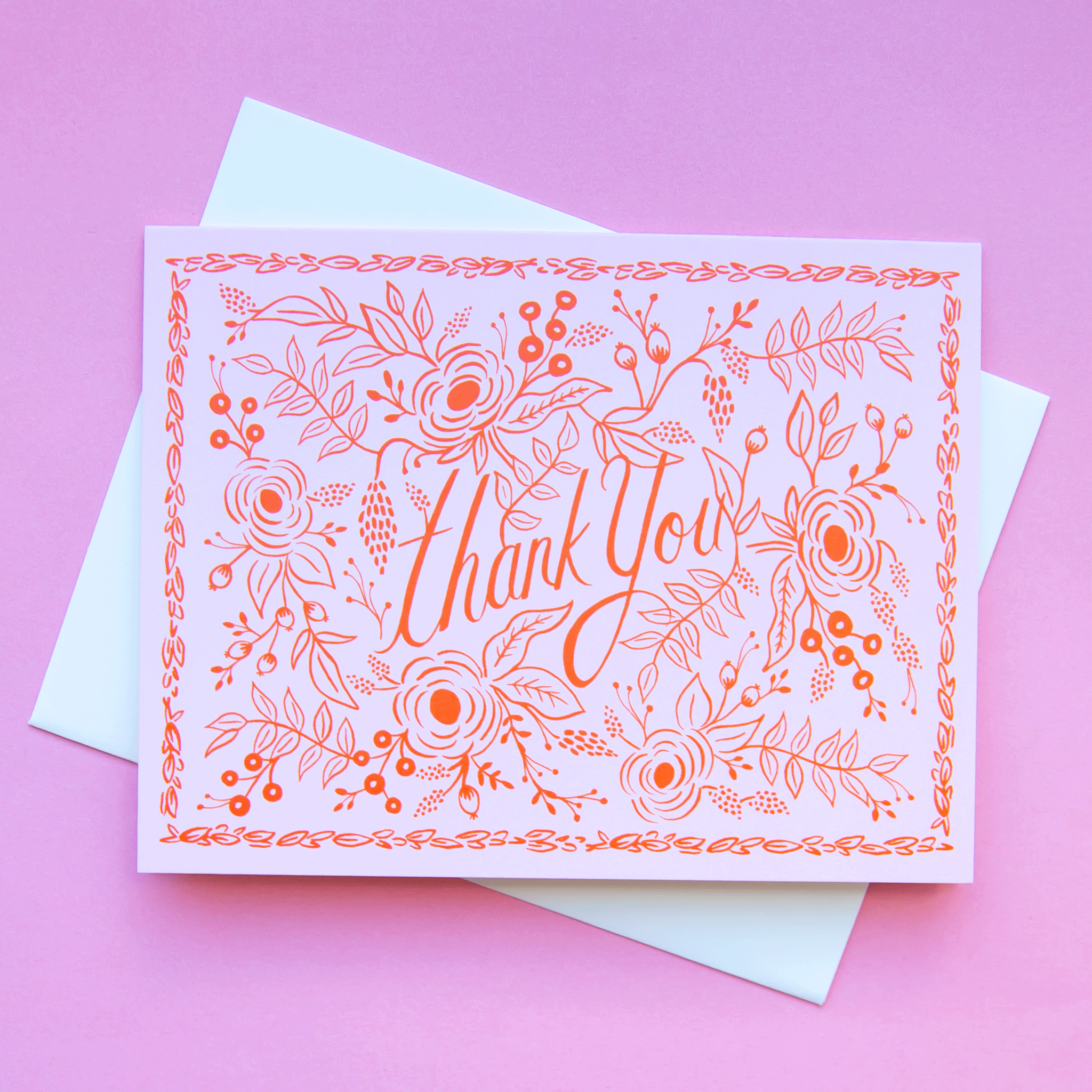 On a purple background is a pink and red thank you card with roses and floral illustrations around text that reads, "Thank You".