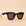 On a peachy background is a black pair of square shaped sunglasses with dark grey lenses. 