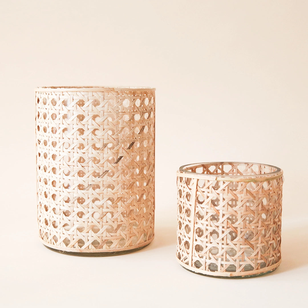 Cane wrapped votives in two different sizes.