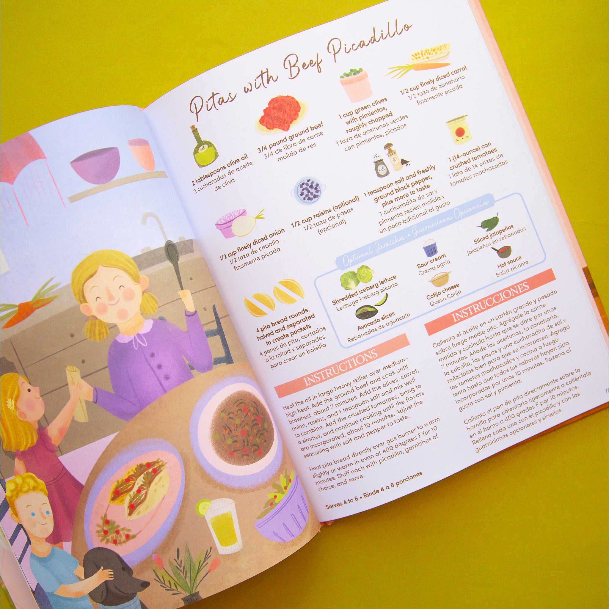 On a green background is the book open to a page containing a recipe with illustrations above each step and a colorful illustration on the left hand page. 