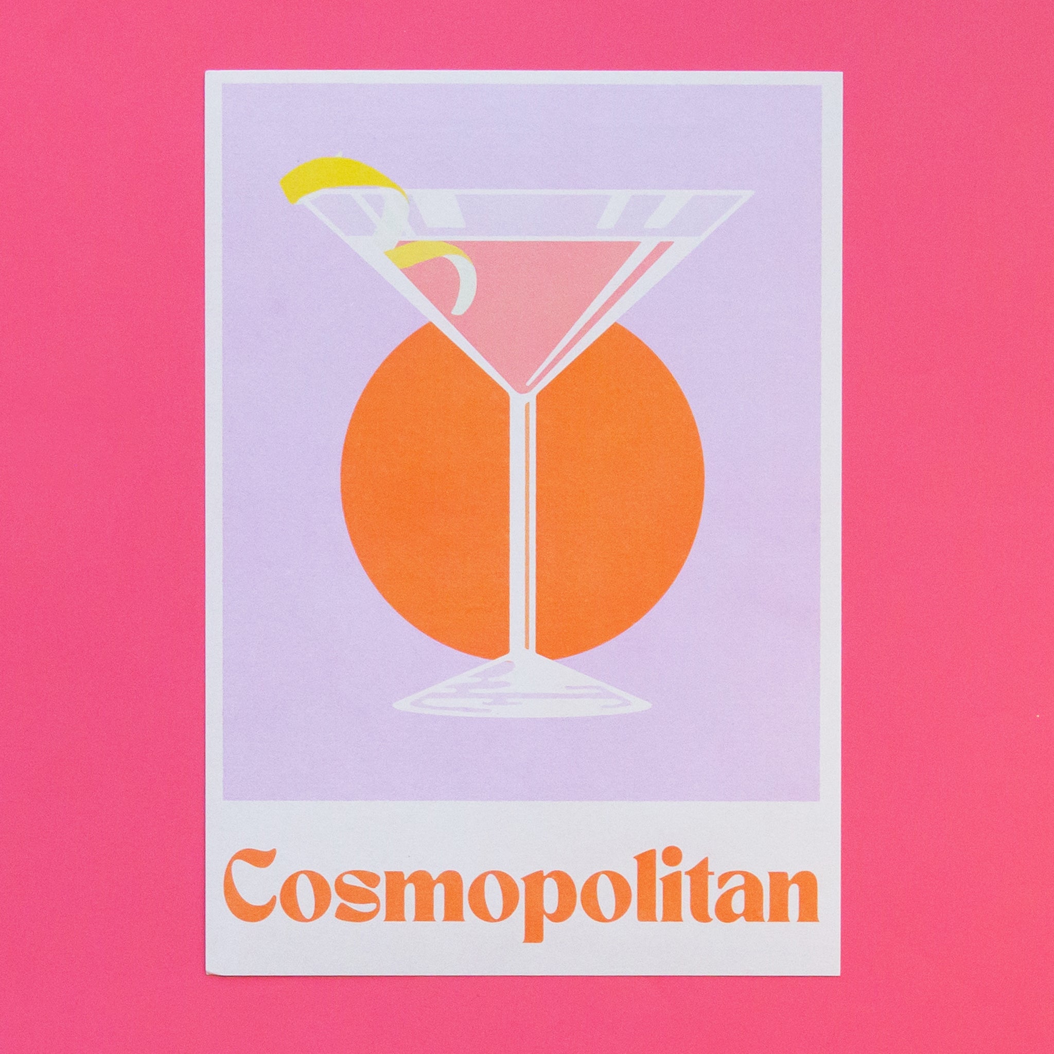 a cosmopolitan cocktail illustration with a lemon twist garnish sits on a purple background. text reads cosmopolitan