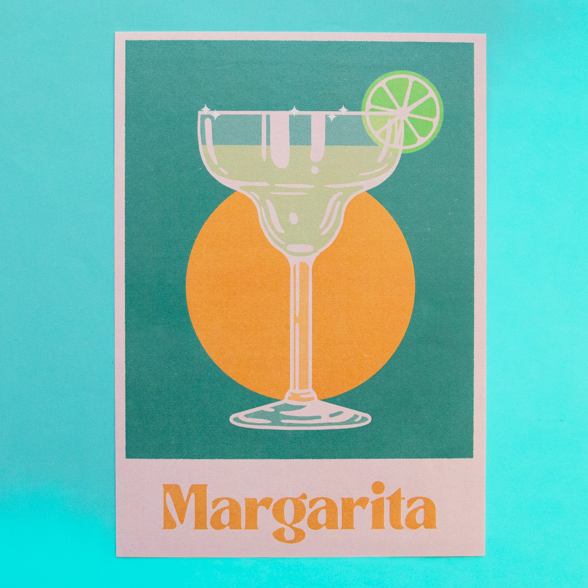 margarita shaped glass with lime wheel on rim over a green background with orange circle. text reads margarita.