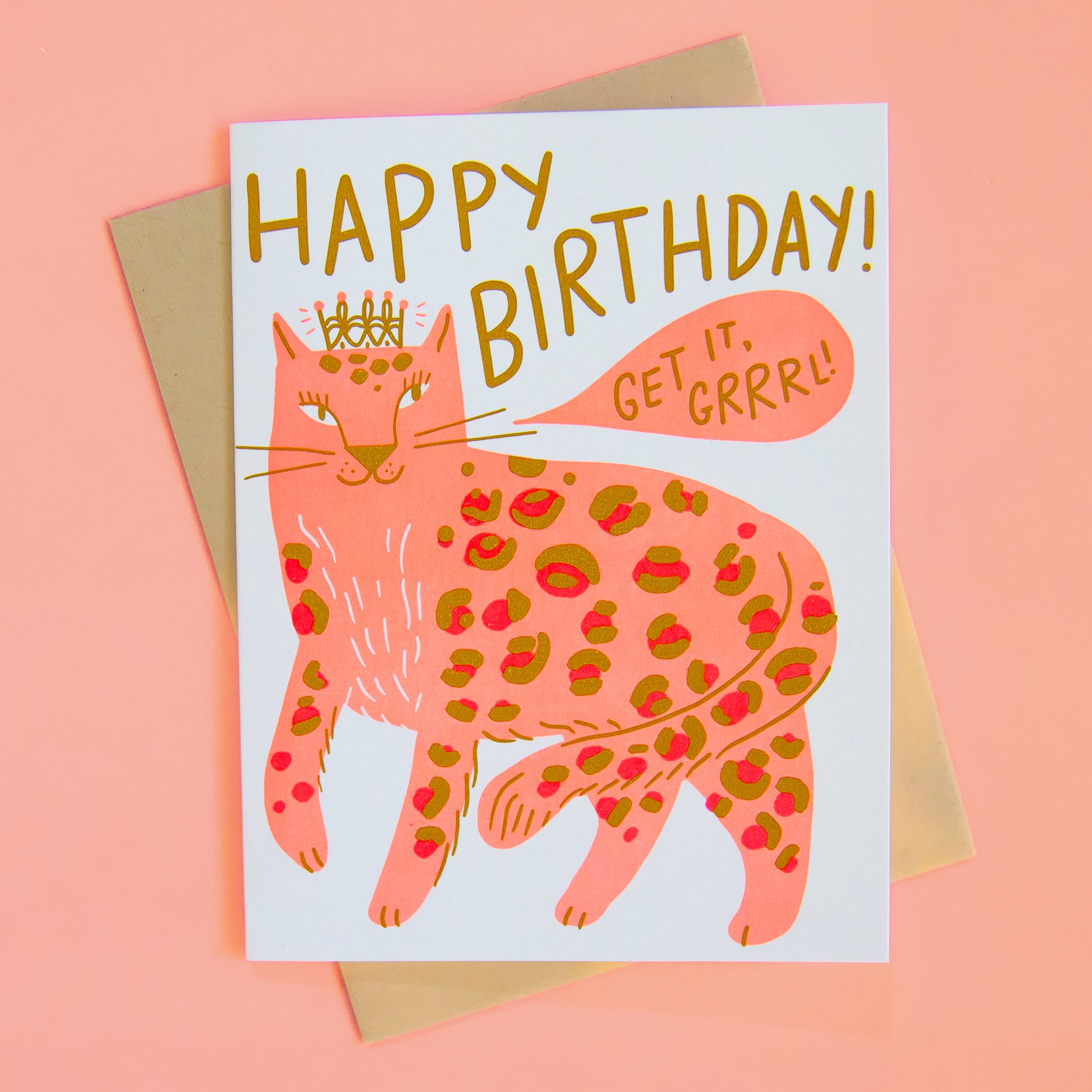 On a peachy background is a white card with a graphic of a pink leopard and text that reads, "Happy Birthday". 