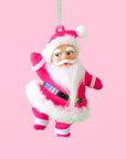 A hot pink suited Santa shape holiday ornament. 
