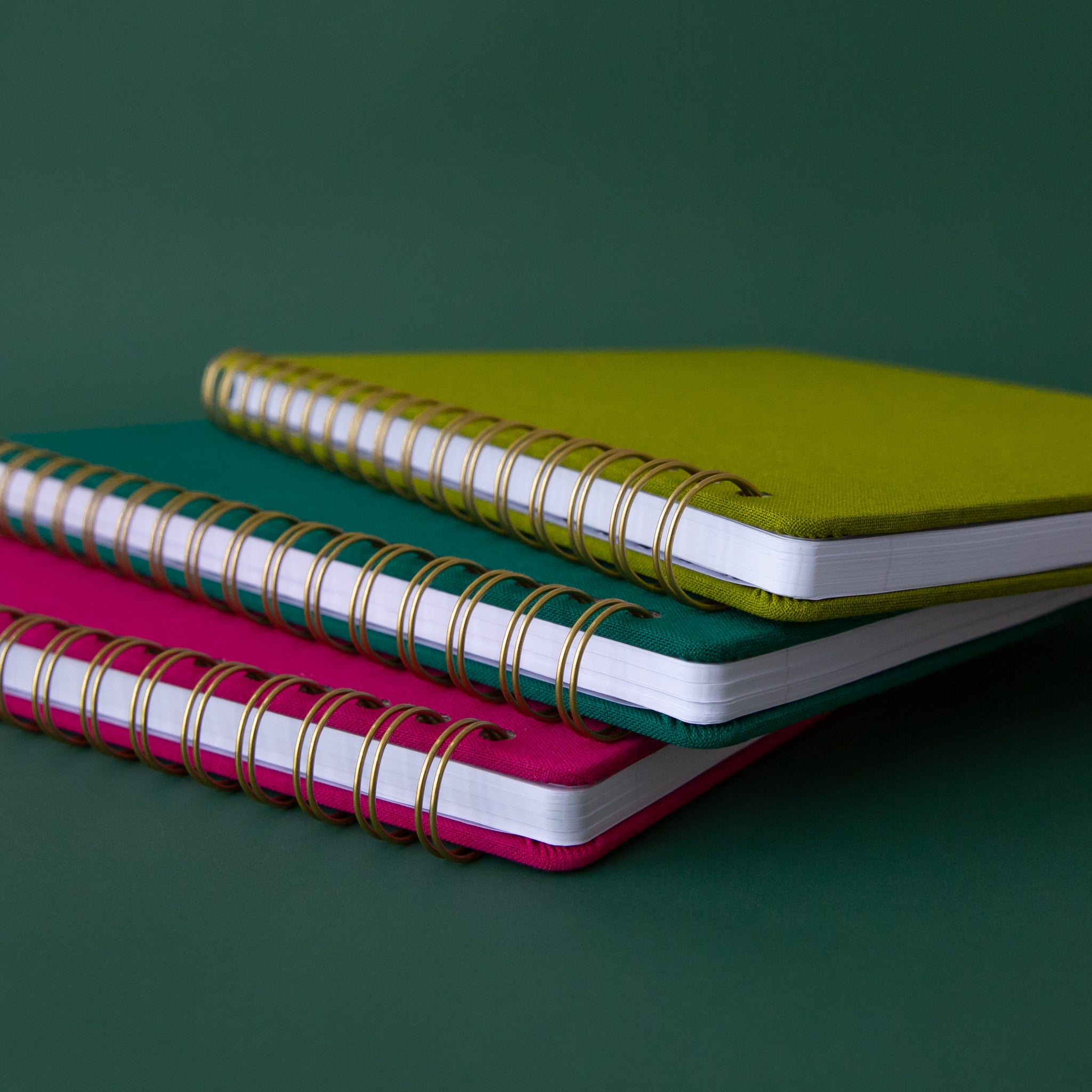All three notebooks on their side. 