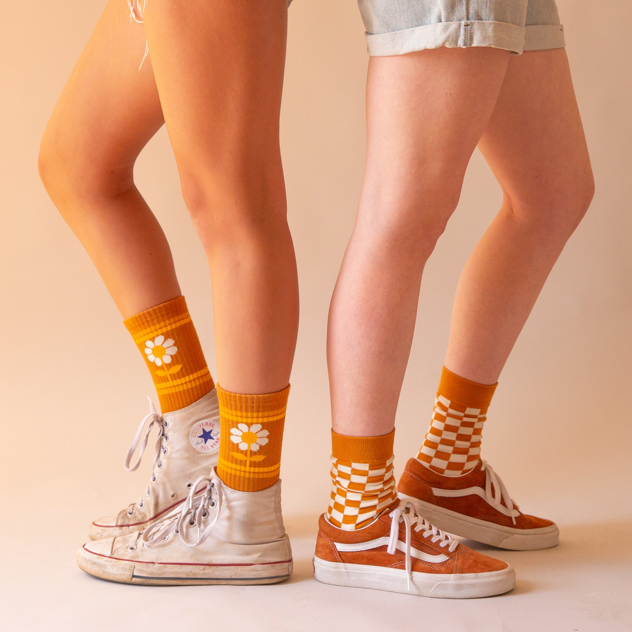 Models wearing two pairs of socks available on our site. 