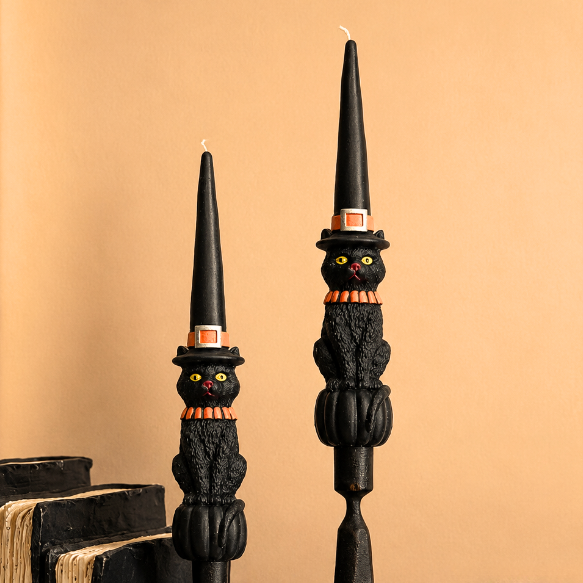 a set of cat witch taper candles