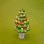 Green tree night light with light up colorful bulbs on the tree. 
