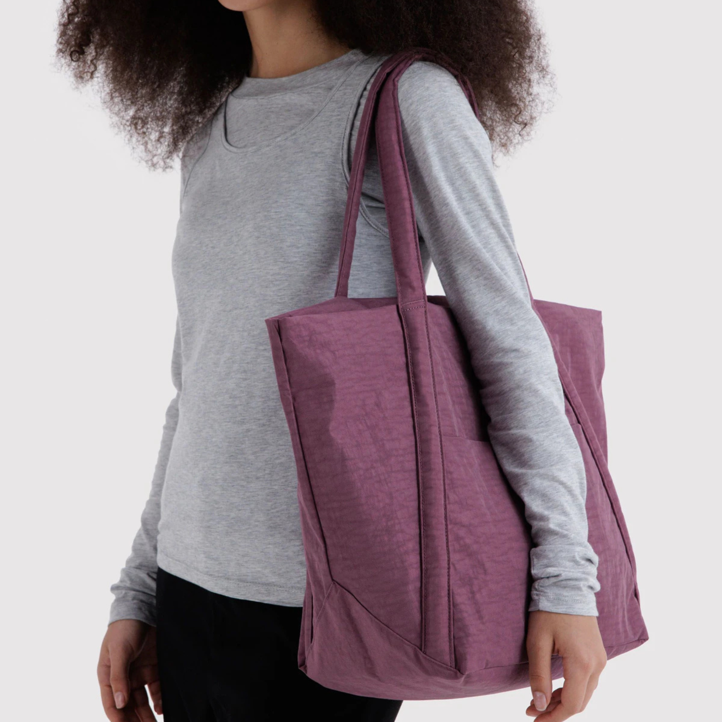 A purple nylon tote bag. 