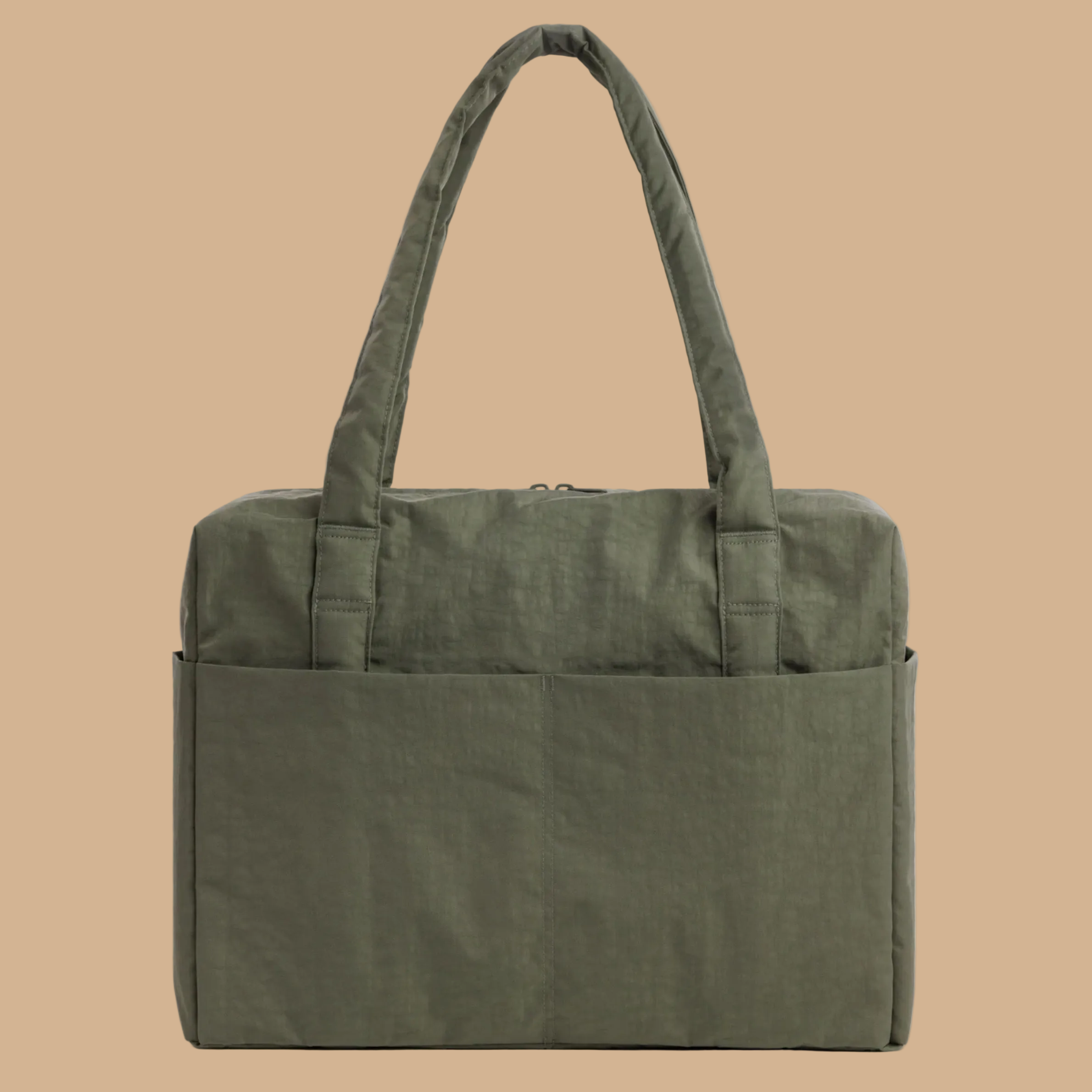 A green carry on bag. 