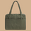 A green carry on bag. 
