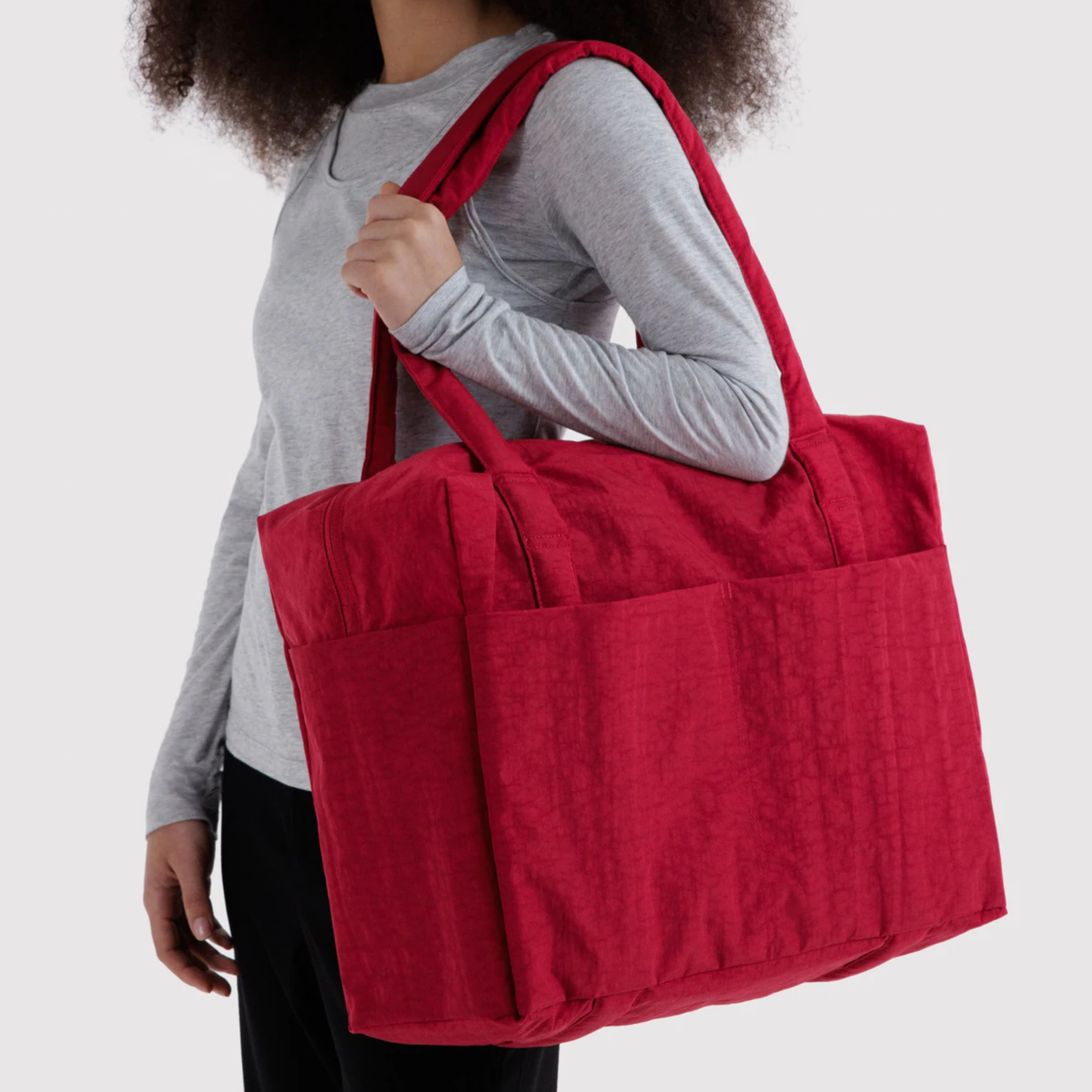A red carry on bag. 