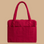 A red carry on bag. 